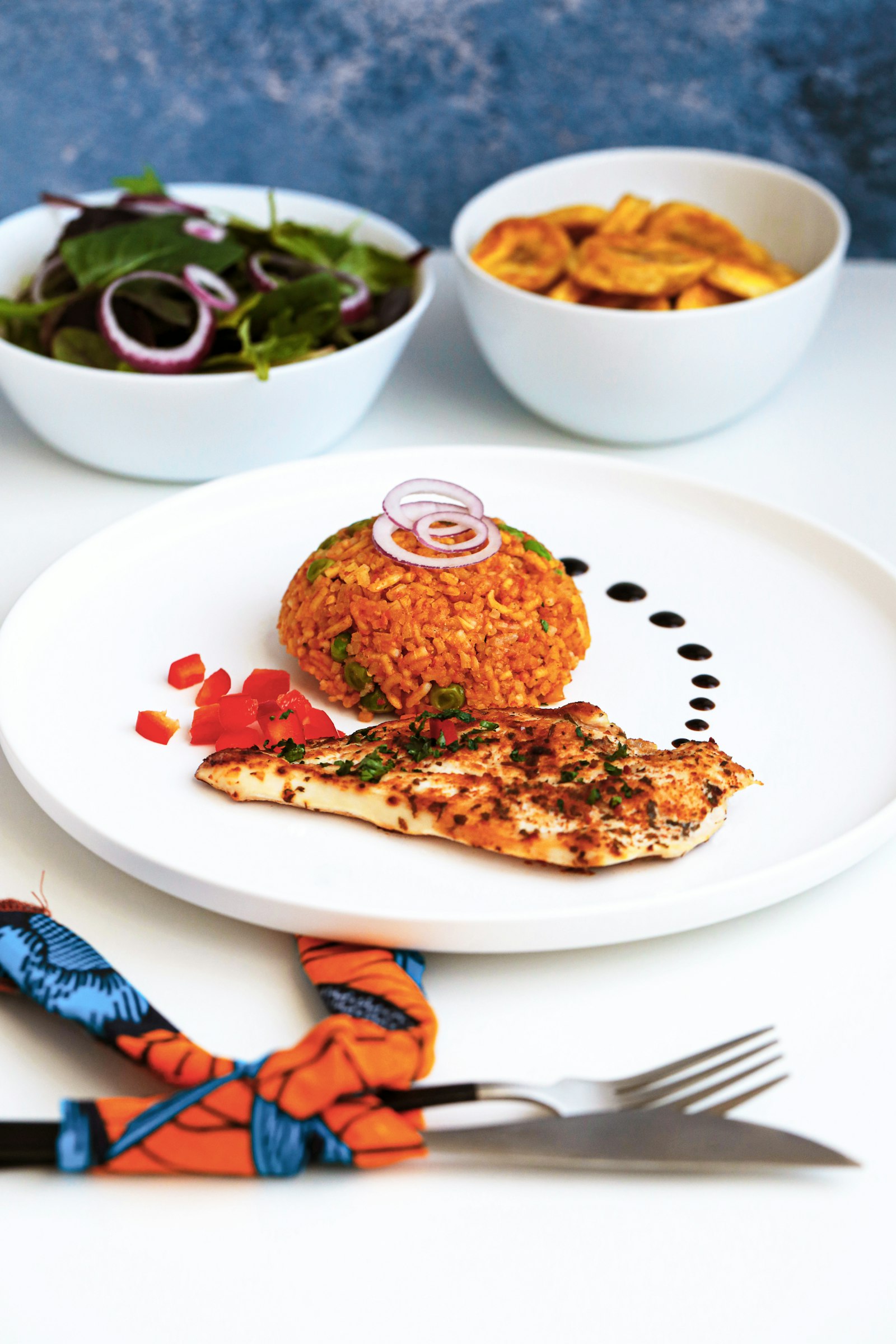 Full plate of African jollof rice with chicken
